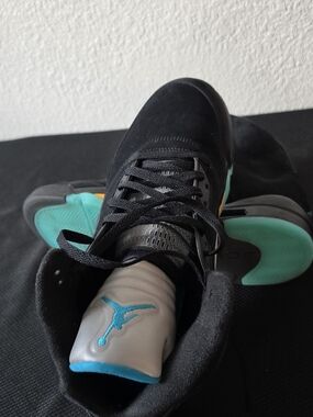 Air Jordan Men’s Black Sneakers with Teal and Orange Accents
